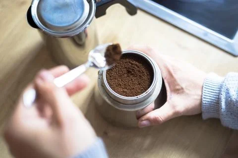 Preparing coffee: Close up of coffee powder in a vintage coffee cooker Stock-Fotos
