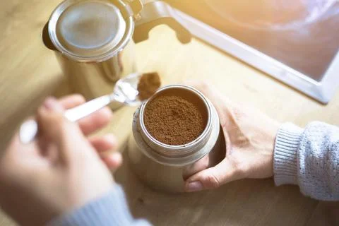 Preparing coffee: Close up of coffee powder in a vintage coffee cooker Stock-Fotos