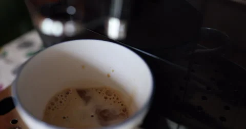 Preparing coffee at the expresso machine. Coffee dripping in the mug. Stock Footage 287921730
