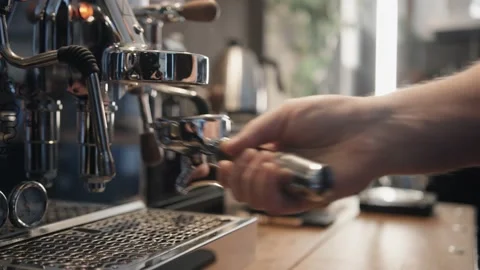 Preparing a coffee machine to make espresso Stock Footage 132719094