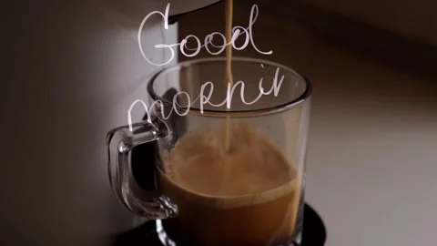 Preparing coffee streams are poured from a white coffee machine or coffee maker Stock Footage 247245387