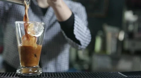 Preparing a cold freddo espresso coffee at the bar Stock Footage 20535664