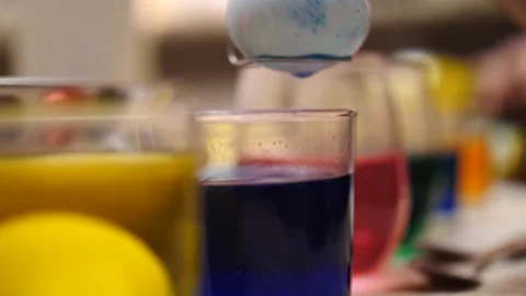 Preparing colorful dyed Easter eggs for the holiday celebration Stock Footage 151503203