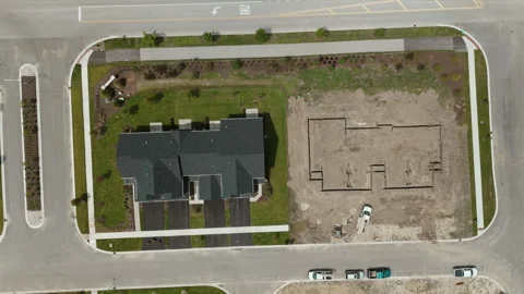 Preparing to construction of house and new house . elements of the foundation of Stock Footage 249092397