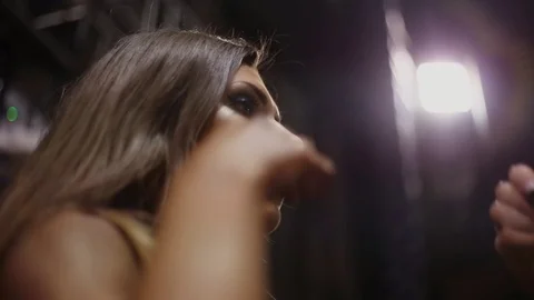 Preparing for contest. Putting mascara on young womans eyelashes. Beautiful girl Stock Footage 70045152