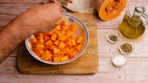 Preparing to cook baked pumpkin. 21 Stock Footage 219346685
