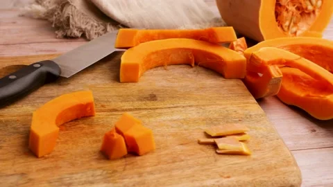 Preparing to cook baked pumpkin. 27 Stock Footage 219346747