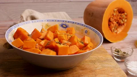 Preparing to cook baked pumpkin. 4 Stock Footage 219346622