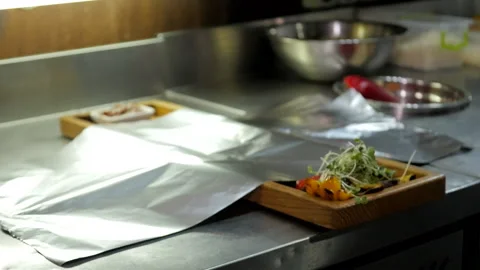 Preparing to Cook Meat on a Hot Stone Stock Footage 132106862