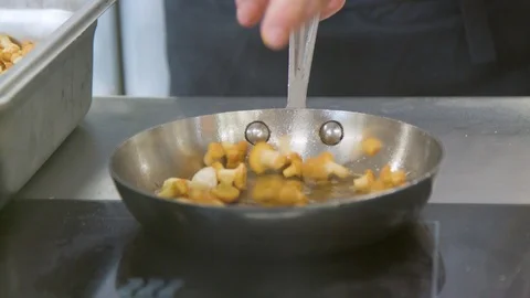Preparing to cook mushrooms Stock Footage 104663692
