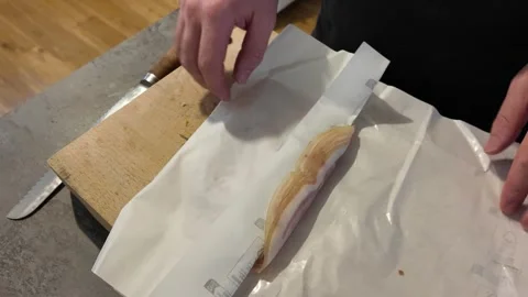Preparing cooked ham slices for homemade sandwiches Stock-Footage 347017984