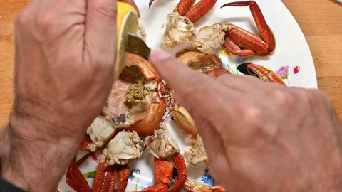 Preparing crabs, adding lemon Stock Footage 228222852