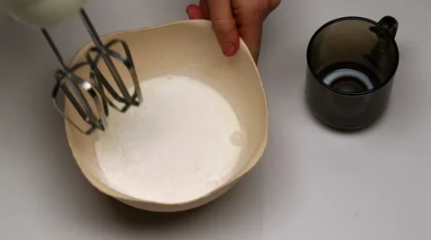 Preparing cream by mixer Stock Footage 60324677