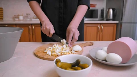 Preparing Creamy Egg Salad. Chopping Boiled Eggs For Salad Mixture 库存影片 328496356