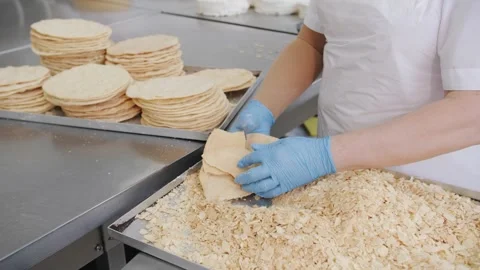 Preparing Crumbs for Cake Decoration Breaking Wafers in Industrial Bakery Stock Footage 321945526