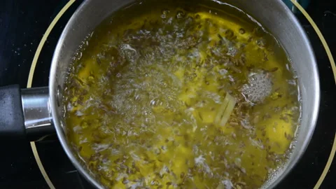Preparing Cumin tea Stock Footage 134523957
