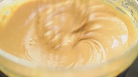 Preparing delicious cream to make cake. Stock Footage 159908946