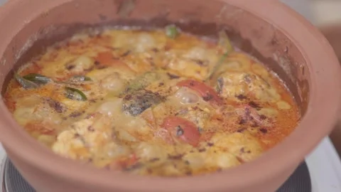 Preparing Delicious Fish Curry Stock Footage 243127650
