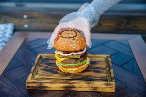 Preparing delicious hamburger Stock Photos