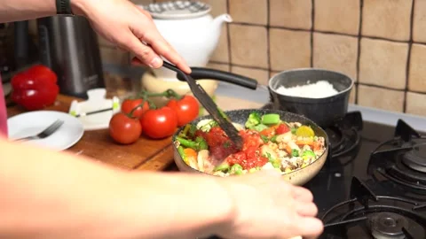  preparing a delicious, healthy and nutritious meal. keeping fit and healthy Video stock 249808338