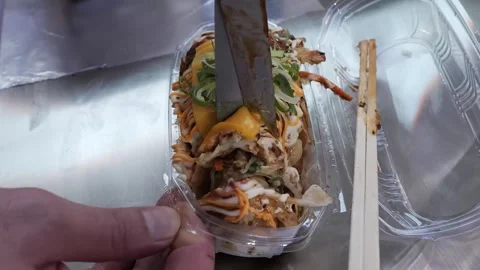Preparing a Delicious Lobster Roll or Seafood Meal in a Takeaway Container Stock Footage 331956609