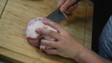 Preparing delicious marinated meat in a cozy kitchen setting Stock Footage 320198790