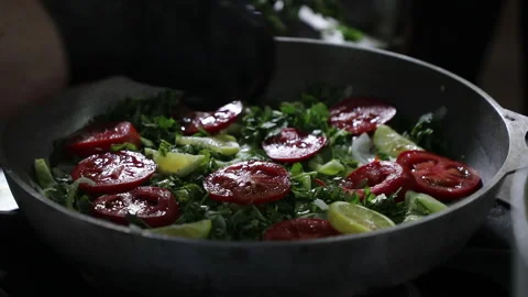Preparing a Delicious Meal in a Pan Stock Footage 296023788