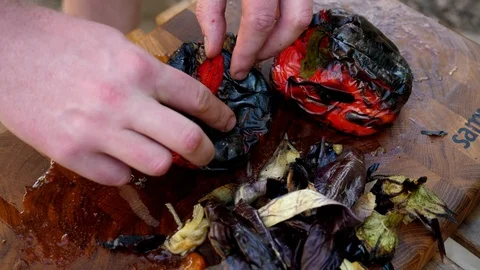 Preparing a delicious side dish of vegetables and herbs for a pork barbecue Video stock 128920876