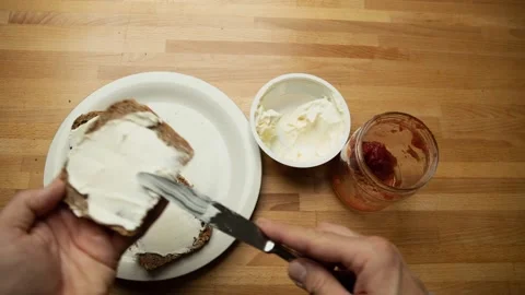 Preparing delicious toasts with jam and cream cheese. Time Lapse. 스톡 동영상 201135068