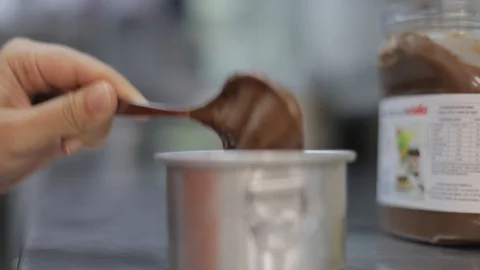 Preparing a Dessert with Nutella Stock Footage 129340326
