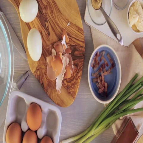 Preparing deviled eggs with organic eggs for appetizer. Step by step recipe. Video stock 69727007