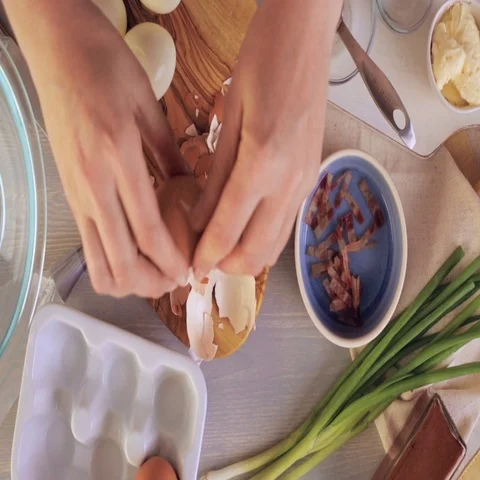 Preparing deviled eggs with organic eggs for appetizer. Step by step recipe. Video stock 69727415