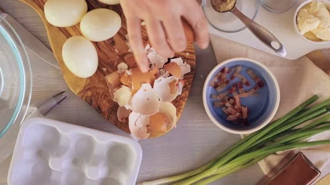 Preparing deviled eggs with organic eggs for appetizer. Step by step recipe. Video stock 69727967