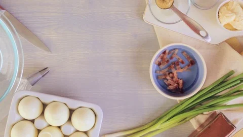 Preparing deviled eggs with organic eggs for appetizer. Step by step recipe. Video stock 69728275