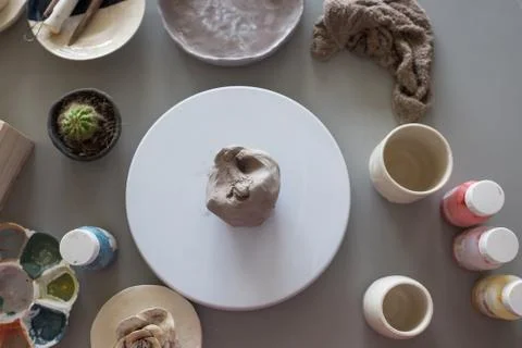 Preparing to do a cup from clay ball. Top view. Stock Photos