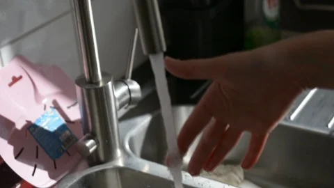 Preparing to do the dishes Stock Footage 111724626