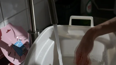 Preparing to do the dishes Stock Footage 111724643