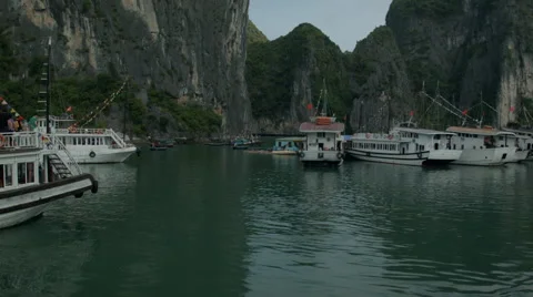 Preparing to Dock in the middle of Ha Long Bay Vietnam Stock Footage 48049718
