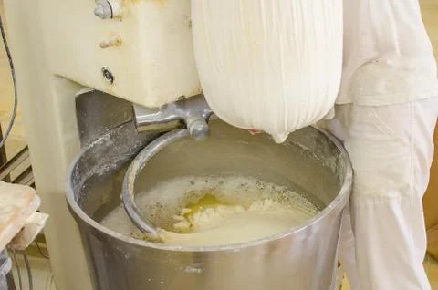 Preparing dough in a bakery. Stock Photos