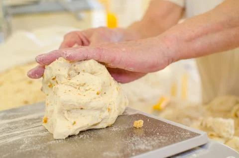 Preparing dough in a bakery. Stock Photos