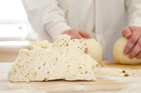 Preparing dough in a bakery. Stock Photos