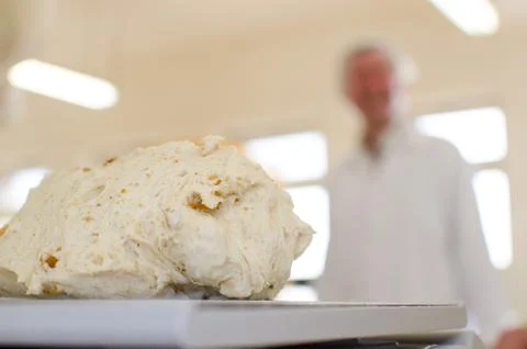 Preparing dough in a bakery. Stock Photos