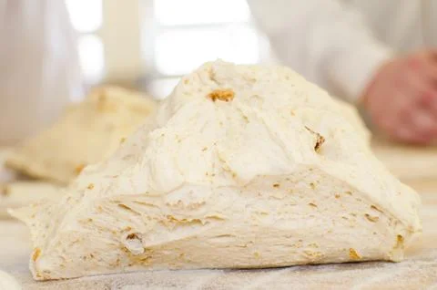 Preparing dough in a bakery. Stock Photos