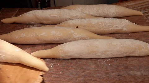 Preparing Dough for Baking Baguettes at Bakery Stock Footage 104239689