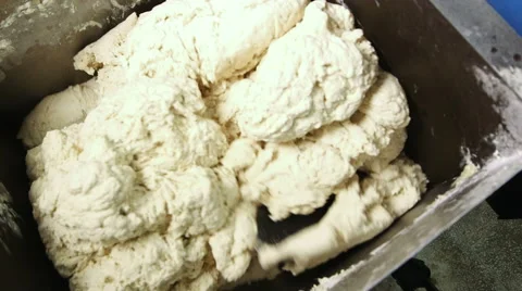 Preparing dough to be baked into bagels 库存影片 50303044
