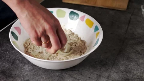 Preparing the Dough in a Bowl for Baking Delicious Treats and Savory Meals With Stock Footage 303373975