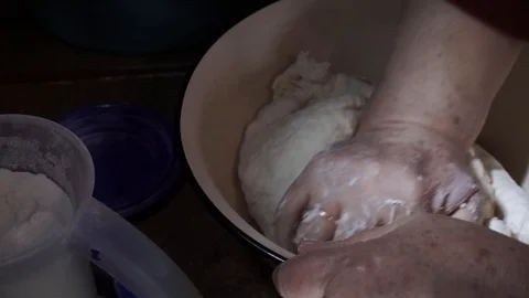 Preparing dough with hands Stock Footage 106197451