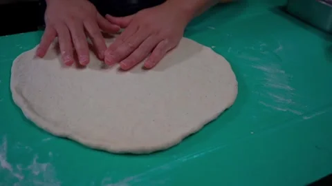 Preparing the Dough for the Oven Stock Footage 293257395