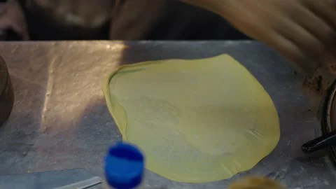 Preparing a dough for thai pancake cooking Stock Footage 234979693