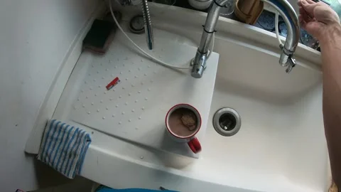 Preparing a Drink in the Kitchen Stock Footage 313918709